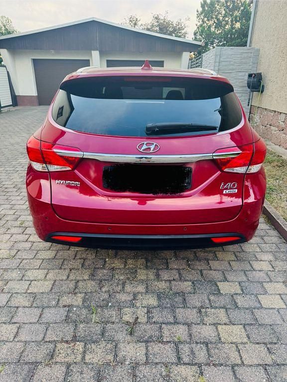 Rot Gebraucht 2015 Hyundai i40 Premium Kombi | 7.600 € (Fairer Preis) - Bild 1/4