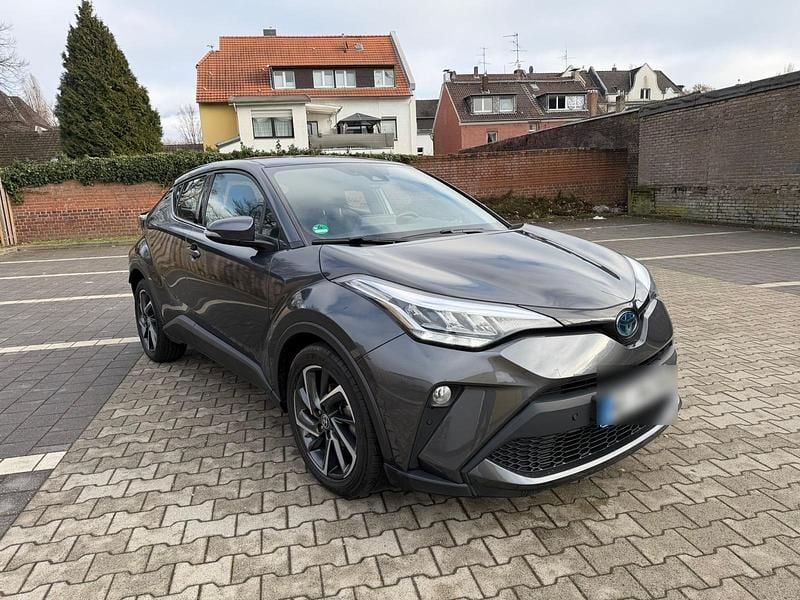Grau Gebraucht 2023 Toyota C-HR SUV | 19.900 € - Bild 1/4