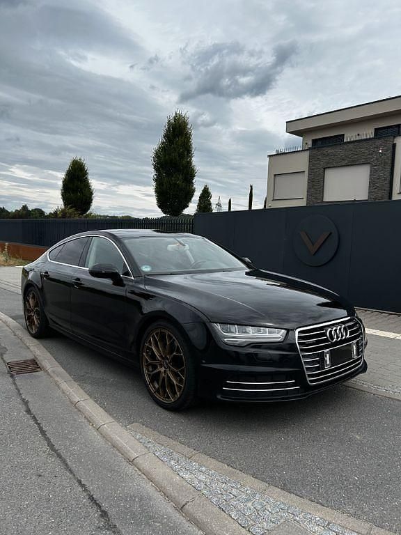 Schwarz Gebraucht 2014 Audi A7 Sportback Comfort Kleinwagen | 16.700 € (Etwas zu teuer) - Bild 1/4