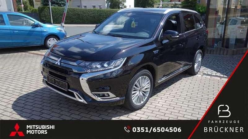 Rubinschwarz Gebraucht 2020 Mitsubishi Outlander P-HEV Plus SUV | 22.390 € (Fairer Preis) - Bild 1/4
