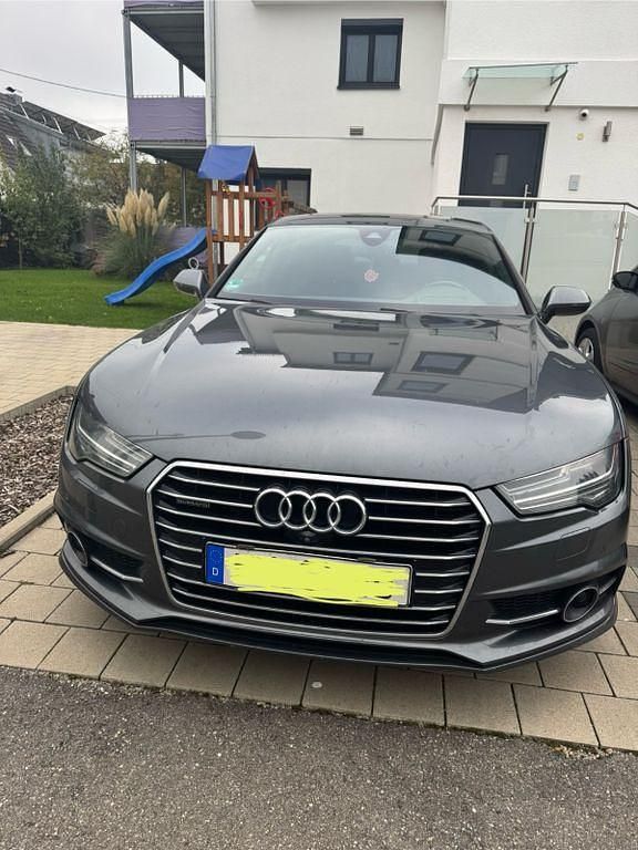 Grau Gebraucht 2017 Audi A7 Sport Limousine | 26.499 € (Fairer Preis) - Bild 1/4