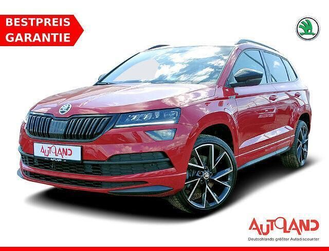 Velvet rot metallic (metallic) Gebraucht 2020 Skoda Karoq SportLine SUV | 26.490 € (Etwas zu teuer) - Bild 1/4
