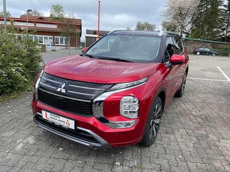 Dynamikrot / pantherschwarz Neu 2025 Mitsubishi Outlander P-HEV Top SUV | 58.990 € (Teuer) - Bild 1/4