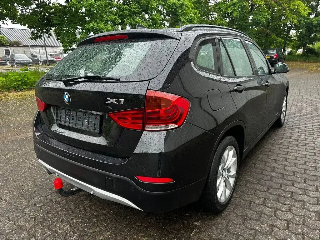 Second-hand BMW X1 143 CP (105 kW) 2013 Negru SUV