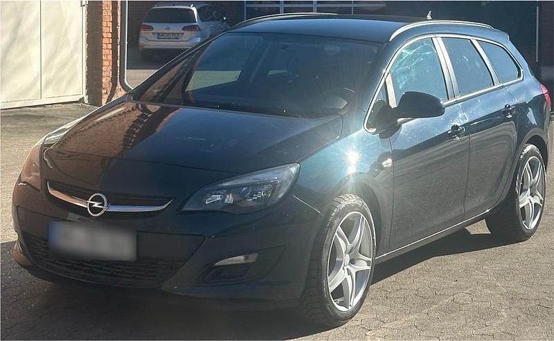 Gebraucht Opel Astra 110 PS (80 kW) 2016 Grün Kombi