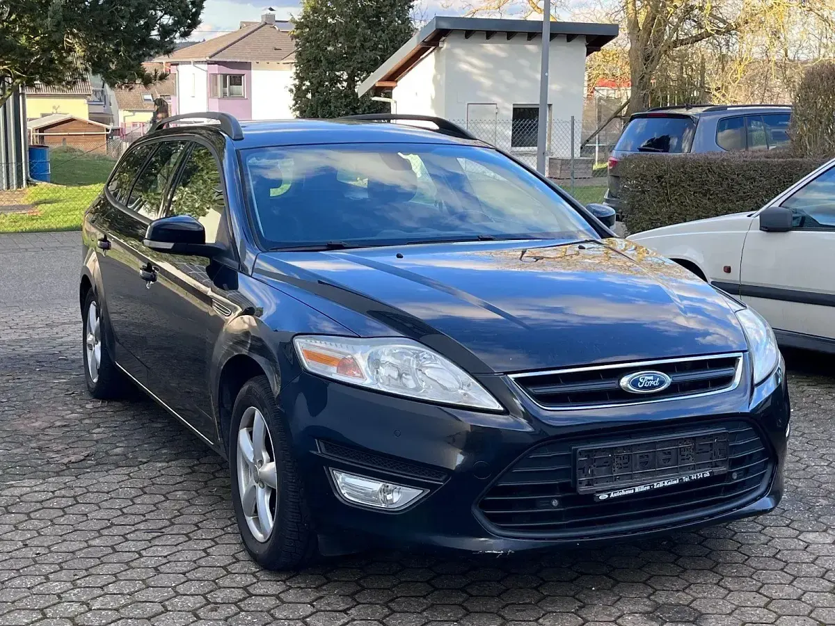 Używany Ford Mondeo 140 KM (102 kW) 2011 Czarny Kombi