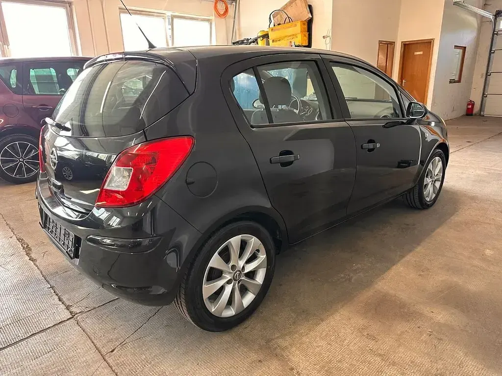 Gebraucht Opel Corsa Active 87 PS (63 kW) 2013 Schwarz Kleinwagen