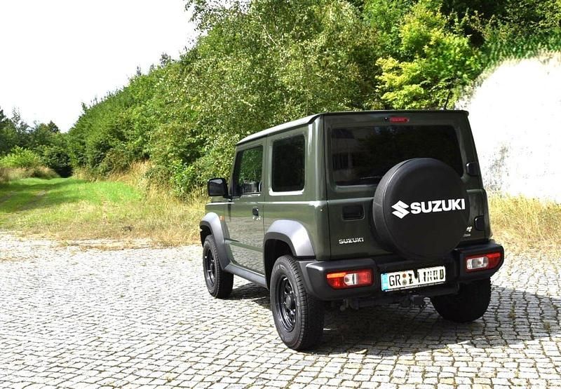 Grün Gebraucht 2023 Suzuki Jimny SUV | 37.500 € - Bild 1/2