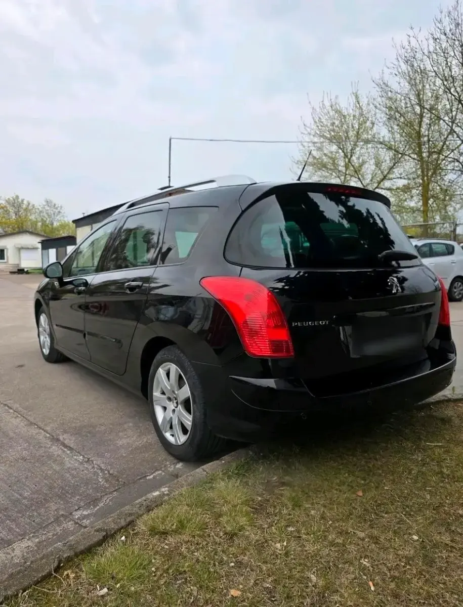 Gebraucht Peugeot 308 SW 156 PS (114 kW) 2011 Schwarz Kombi