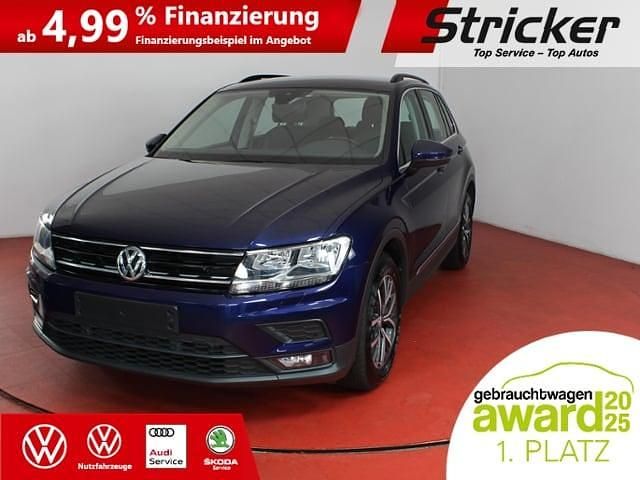 Atlantic blue metallic (metallic) Gebraucht 2019 VW Tiguan Comfortline SUV | 21.950 € (Guter Preis) - Bild 1/4
