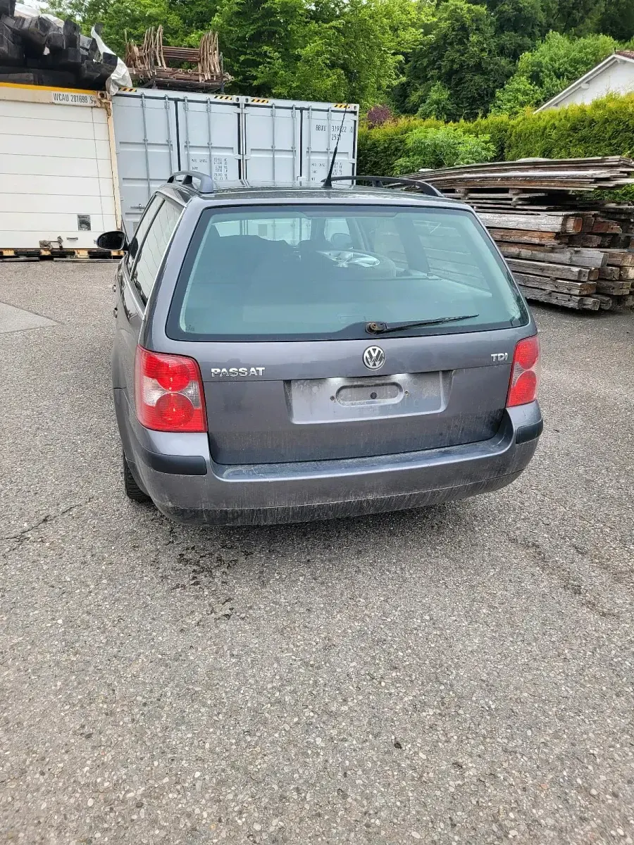 Używany VW Passat 131 KM (96 kW) 2005 Szary Kombi
