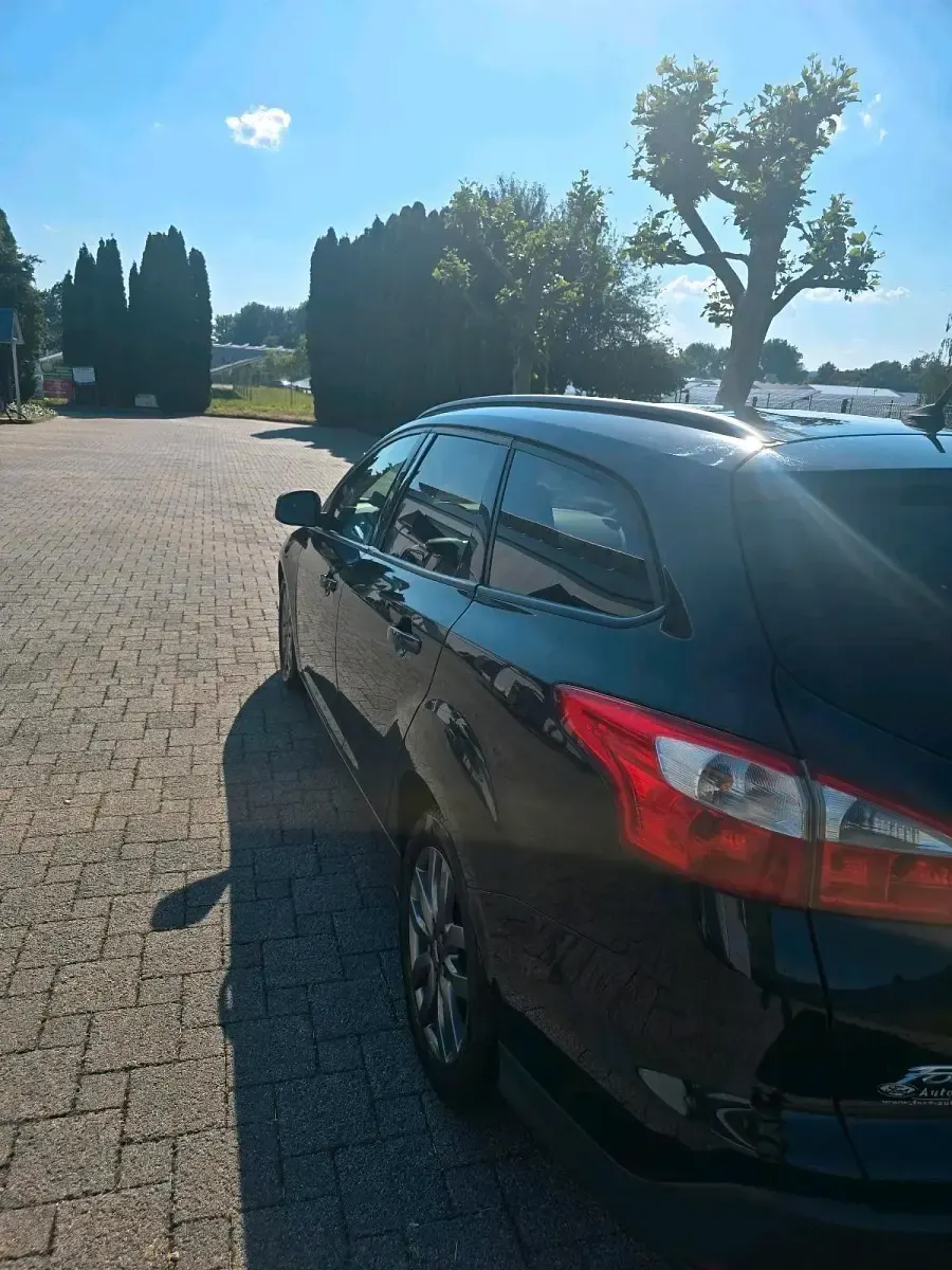 Gebraucht Ford Focus 116 PS (85 kW) 2011 Schwarz Kombi