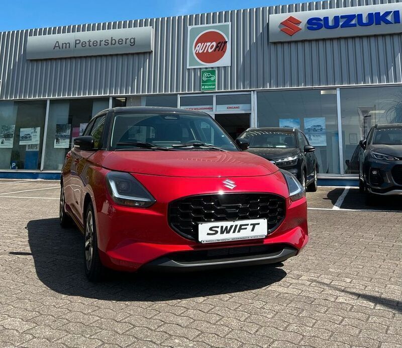 Rot Neu 2025 Suzuki Swift Comfort+ Limousine | 21.300 € - Bild 1/4