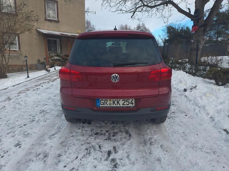 Używany VW Tiguan 140 KM (102 kW) 2013 Czerwony SUV