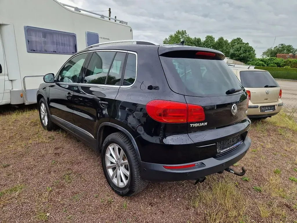 Gebraucht VW Tiguan Sport 150 PS (110 kW) 2015 Deep black perleffekt (metallic) SUV