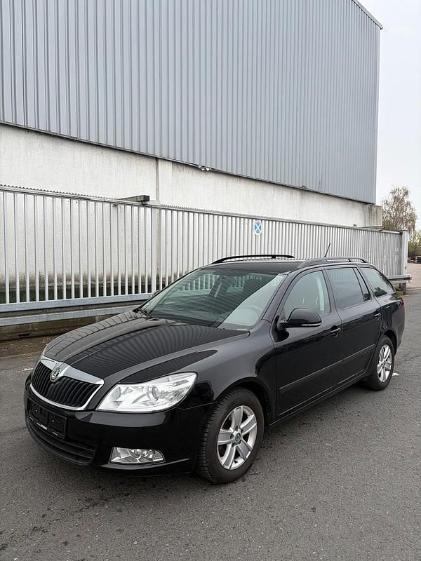 Second-hand Skoda Octavia 105 CP (77 kW) 2012 Negru Break