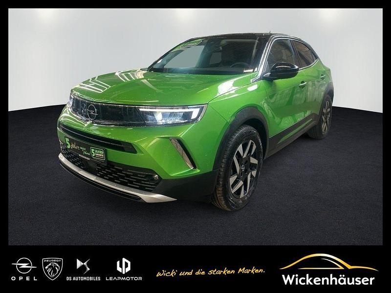 Matcha green/ikone gruen Gebraucht 2022 Opel Mokka-e Elegance SUV | 16.990 € (Fairer Preis) - Bild 1/4