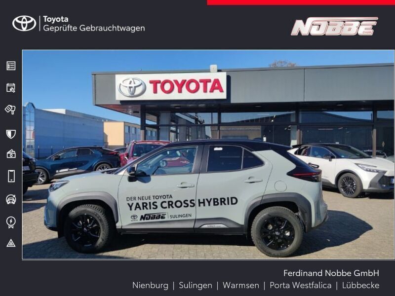 Urban khaki (metallic) Gebraucht 2024 Toyota Yaris Hybrid Edition SUV | 34.990 € (Teuer) - Bild 1/4