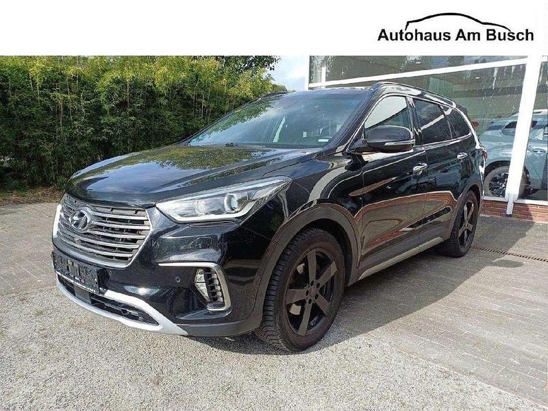 Timeless black / mic Gebraucht 2017 Hyundai Grand Santa Fe Premium SUV | 18.990 € (Teuer) - Bild 1/4