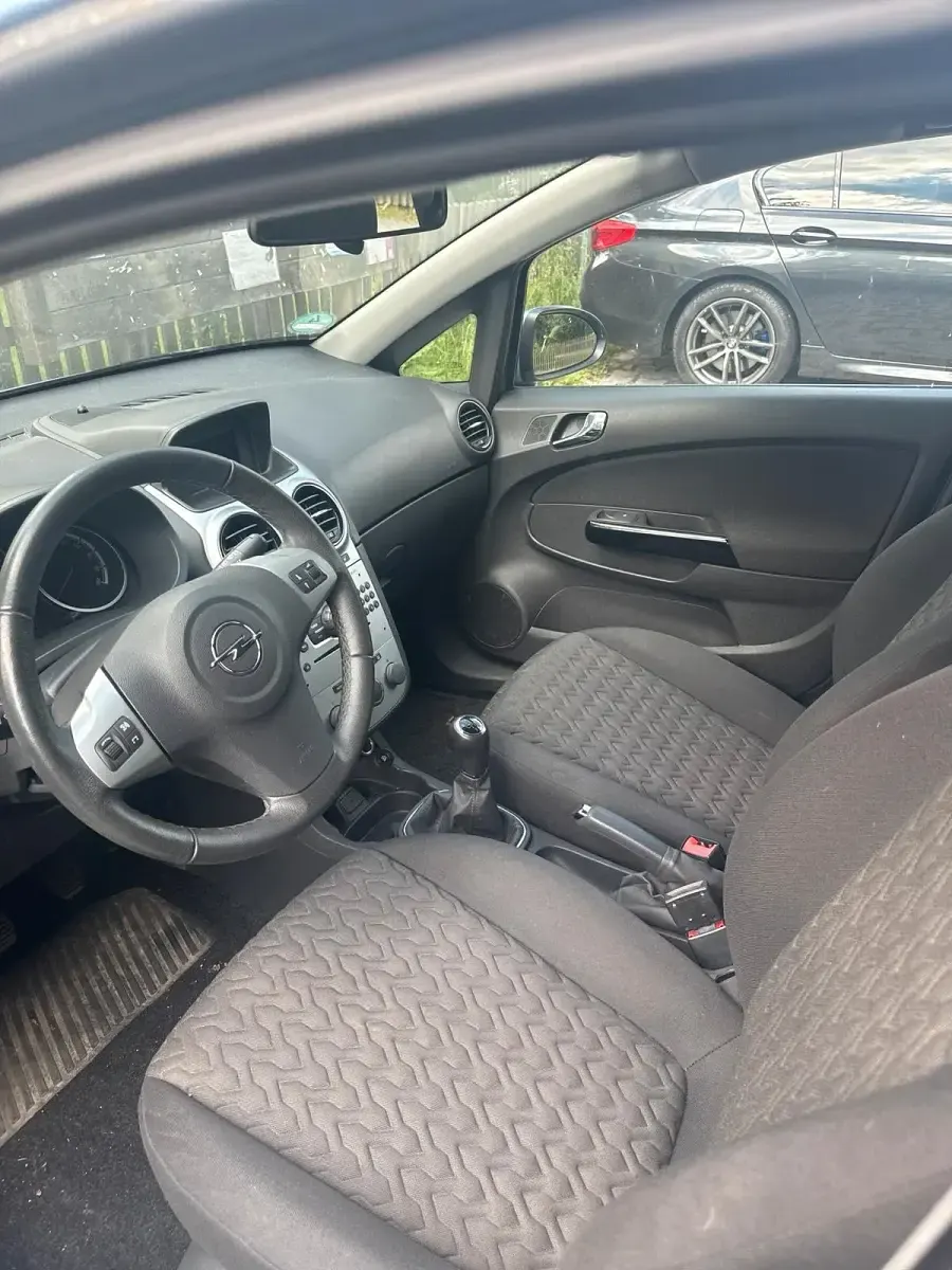 Gebraucht Opel Corsa 78 PS (57 kW) 2013 Blau Kleinwagen