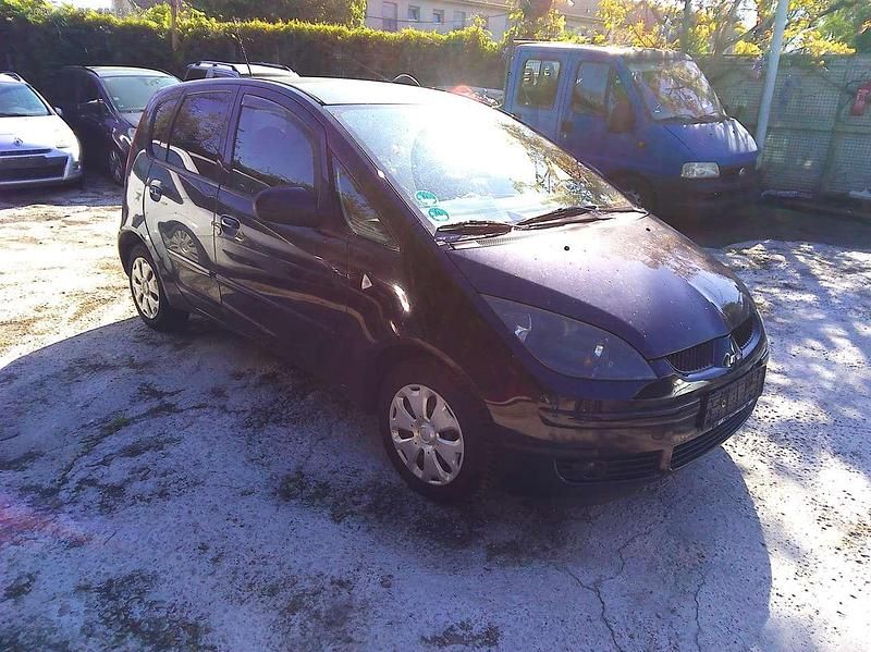 Second-hand Mitsubishi Colt 95 CP (69 kW) 2008 Negru Berlinǎ