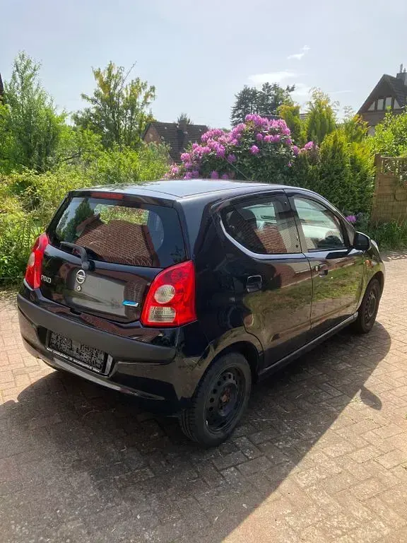 Gebraucht Nissan Pixo Acenta 68 PS (50 kW) 2009 Schwarz Kleinwagen