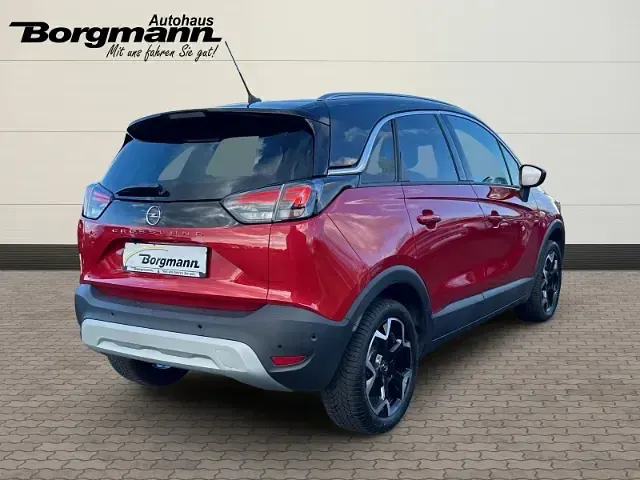 Gebraucht Opel Crossland Ultimate 131 PS (96 kW) 2024 Lackierung peperoncino red/met SUV