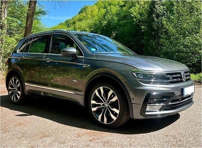 Grau Gebraucht 2017 VW Tiguan Highline SUV | 29.500 € (Teuer) - Bild 1/4