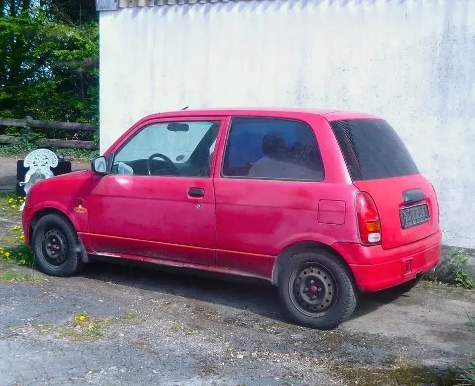 Gebraucht Daihatsu Cuore Plus 56 PS (41 kW) 1998 Rot Kleinwagen
