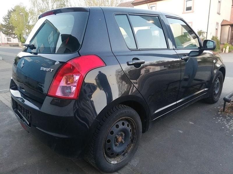 Second-hand Suzuki Swift 92 CP (67 kW) 2009 Negru Hatchback