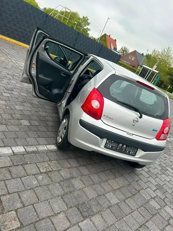 Gebraucht Nissan Pixo Acenta 68 PS (50 kW) 2010 Silber Kleinwagen