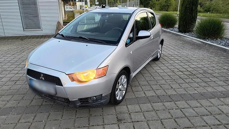 Second-hand Mitsubishi Colt 95 CP (69 kW) 2012 Argintiu Hatchback