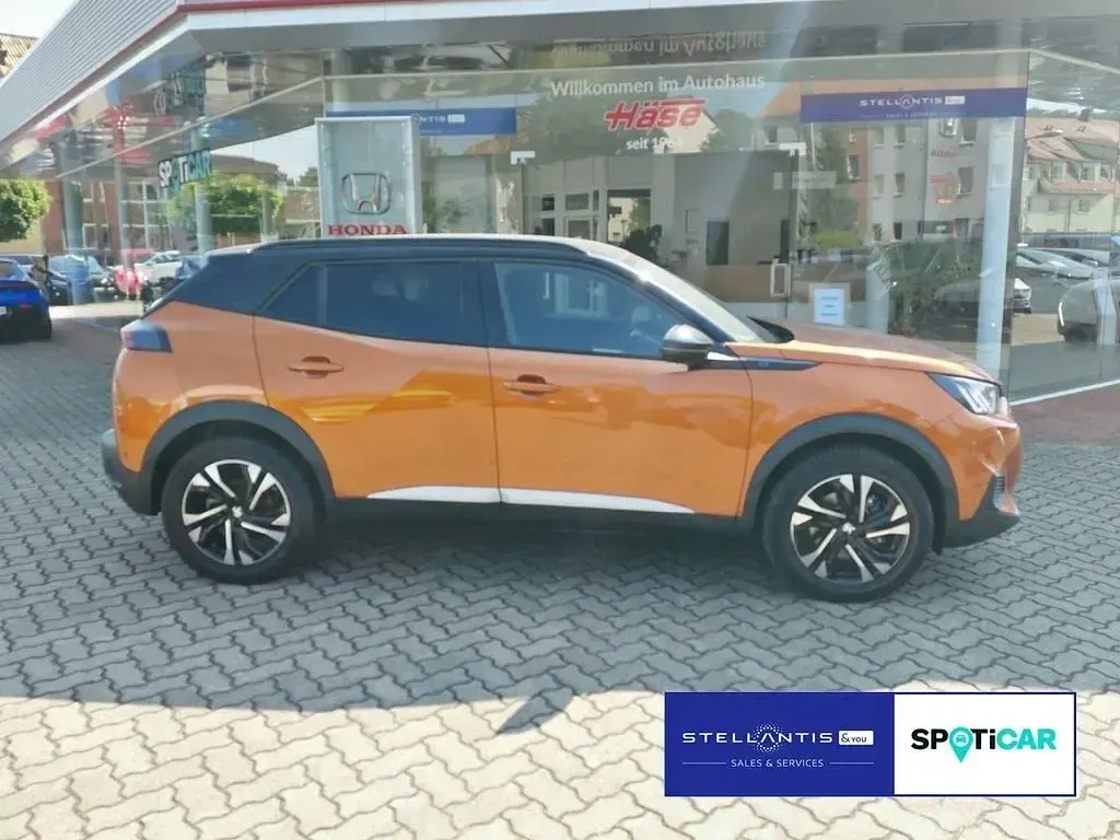 Gebraucht Peugeot e-2008 GT 100 kW (136 PS) 2023 Orange SUV