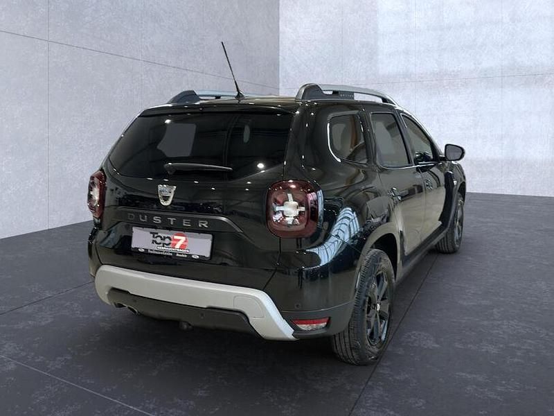 Gebraucht Dacia Duster 131 PS (96 kW) 2021 Perlmuttschwarz perleffekt (metallic) SUV