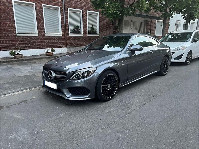 Grau Gebraucht 2016 Mercedes C200 AMG line Coupé | 22.750 € (Fairer Preis) - Bild 1/4