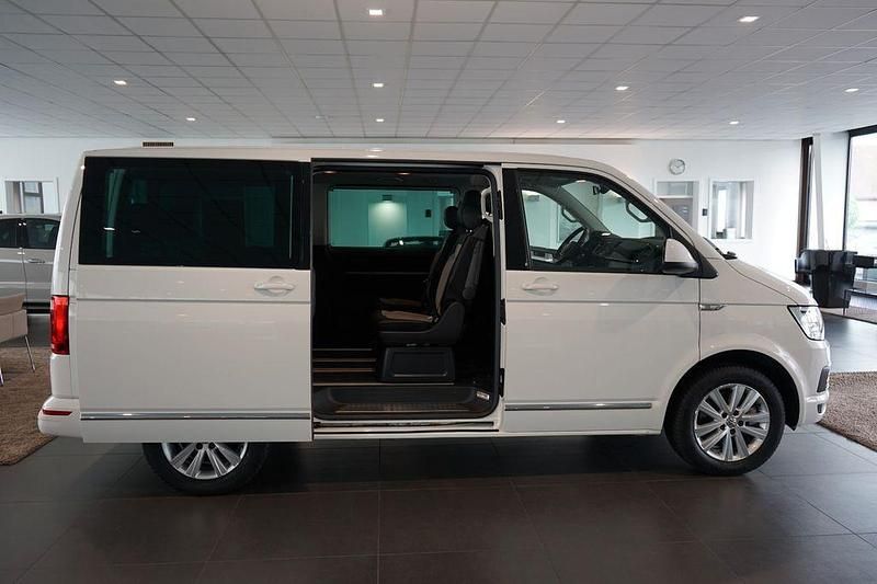 Second-hand VW Multivan Generation Six 204 CP (150 kW) 2016 Alb Monovolum