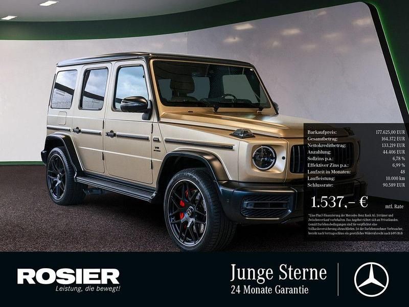 Gold / manufaktur kalaharigold magno (metallic) Gebraucht 2023 Mercedes G63 AMG AMG SUV | 177.625 € (Etwas zu teuer) - Bild 1/4