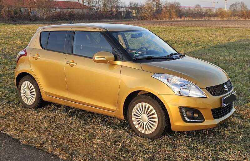 Gold Gebraucht 2015 Suzuki Swift Limousine | 7.400 € (Etwas zu teuer) - Bild 1/4