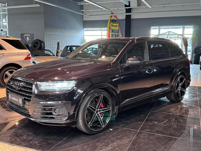 Orcaschwarz/deep black Gebraucht 2018 Audi SQ7 Ambiente SUV | 37.995 € (Fairer Preis) - Bild 1/4