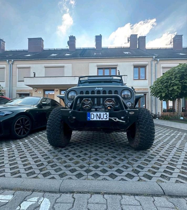 Grün Gebraucht 2016 Jeep Wrangler SUV | 32.000 € (Fairer Preis) - Bild 1/4