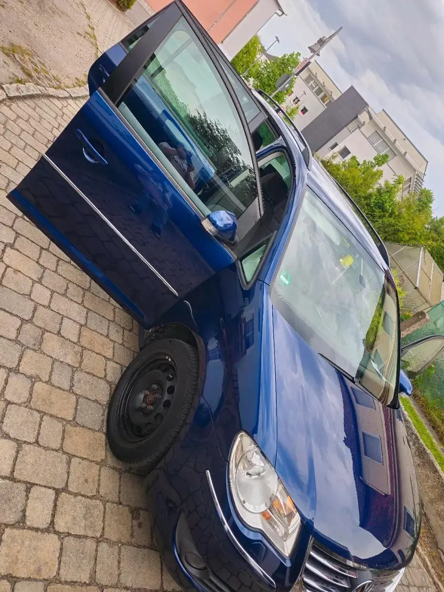 Używany VW Touran 140 KM (102 kW) 2007 Niebieski Minivan