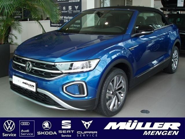 Blau Gebraucht 2024 VW T-Roc Cabriolet Move Cabrio | 31.990 € (Guter Preis) - Bild 1/4