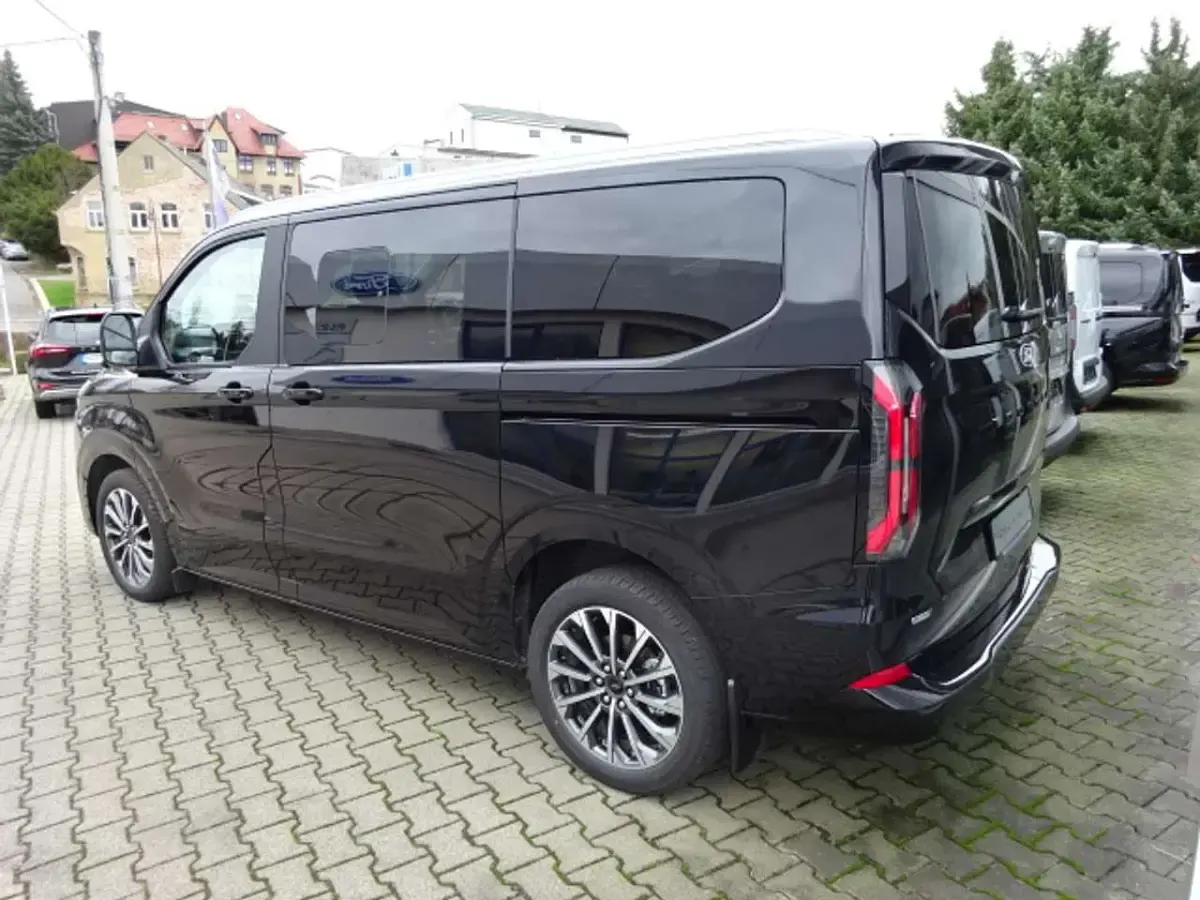 Gebraucht Ford Tourneo Custom Titanium X 232 PS (170 kW) 2025 Agate black metallic Van