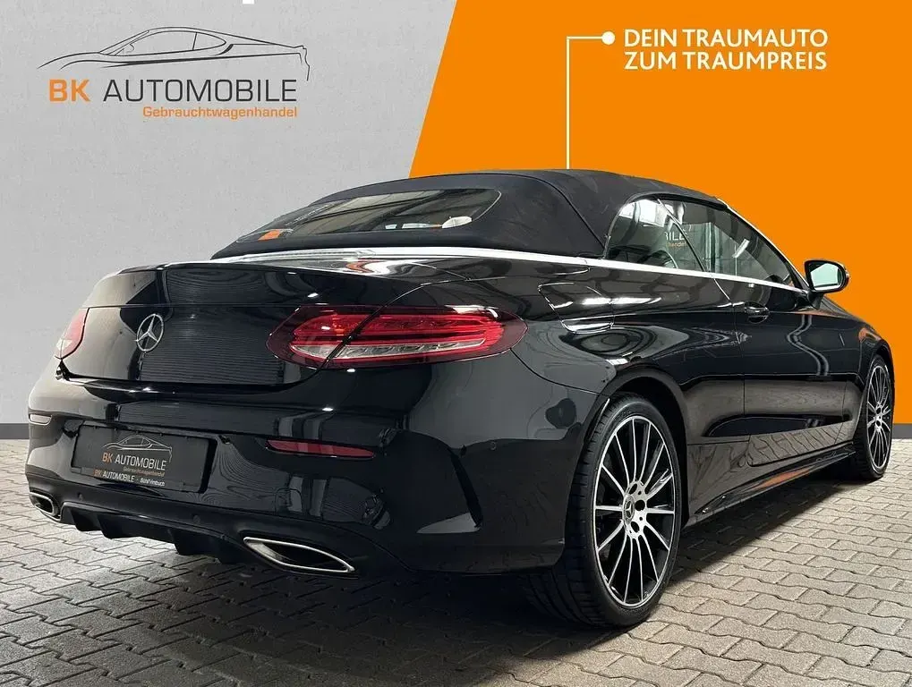 Gebraucht Mercedes C180 AMG 156 PS (114 kW) 2021 Obsidianschwarz Cabrio