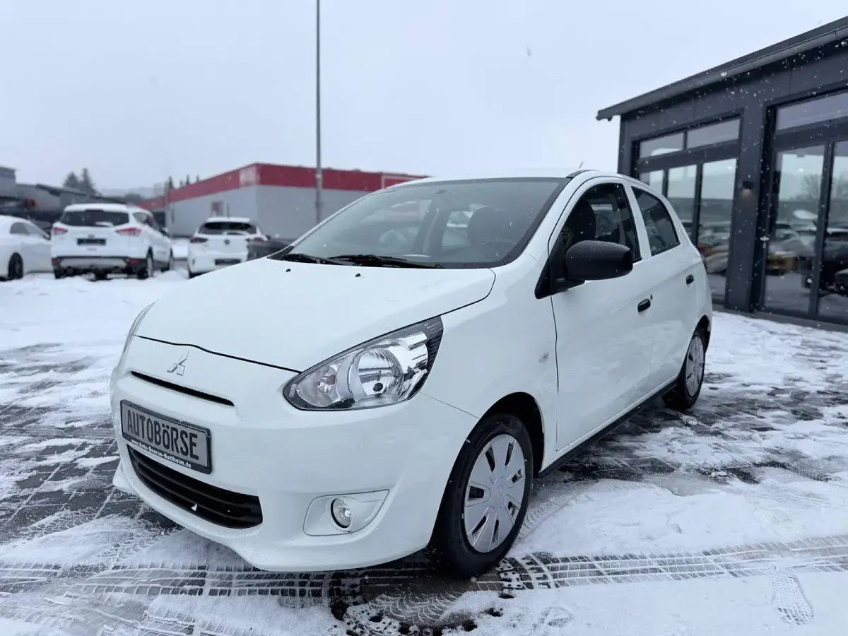 Gebraucht Mitsubishi Space Star Diamant Edition 71 PS (52 kW) 2015 Islandweiss (s) Kleinwagen