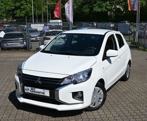 Weiß Gebraucht 2021 Mitsubishi Space Star Spirit Limousine | 9.999 € (Fairer Preis) - Bild 1/4