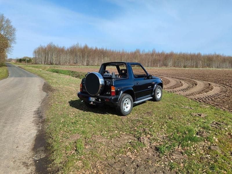 Gebraucht Suzuki Vitara 80 PS (58 kW) 1992 Schwarz Cabrio