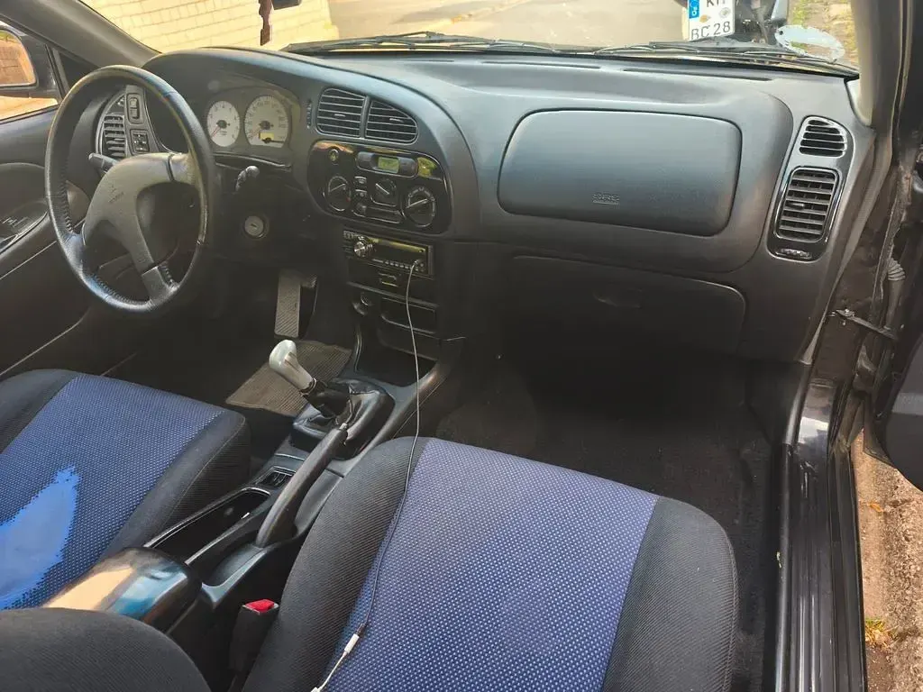 Gebraucht Mitsubishi Colt 82 PS (60 kW) 2003 Grün Kleinwagen