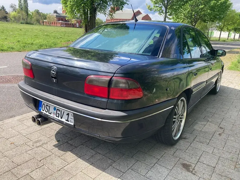Second-hand Opel Omega 211 CP (155 kW) 1997 Negru Berlinǎ