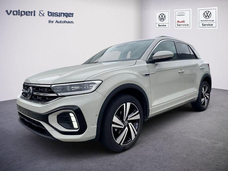 Ascotgrau Gebraucht 2024 VW T-Roc R-line SUV | 29.640 € (Superpreis) - Bild 1/4